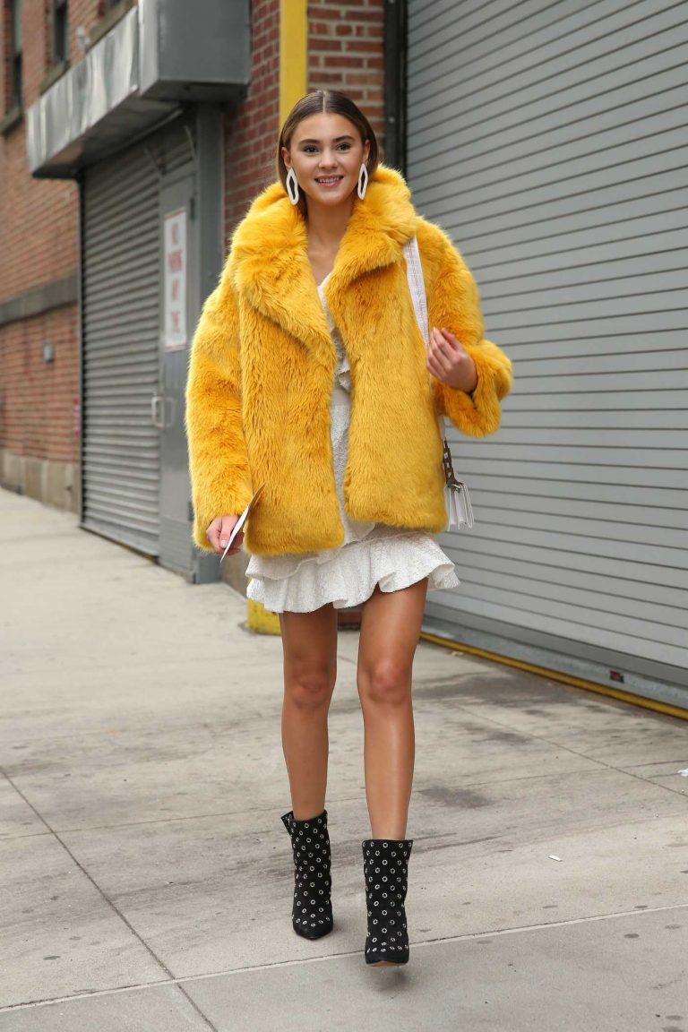 Stefanie Giesinger in a Short Yellow Fur Coat