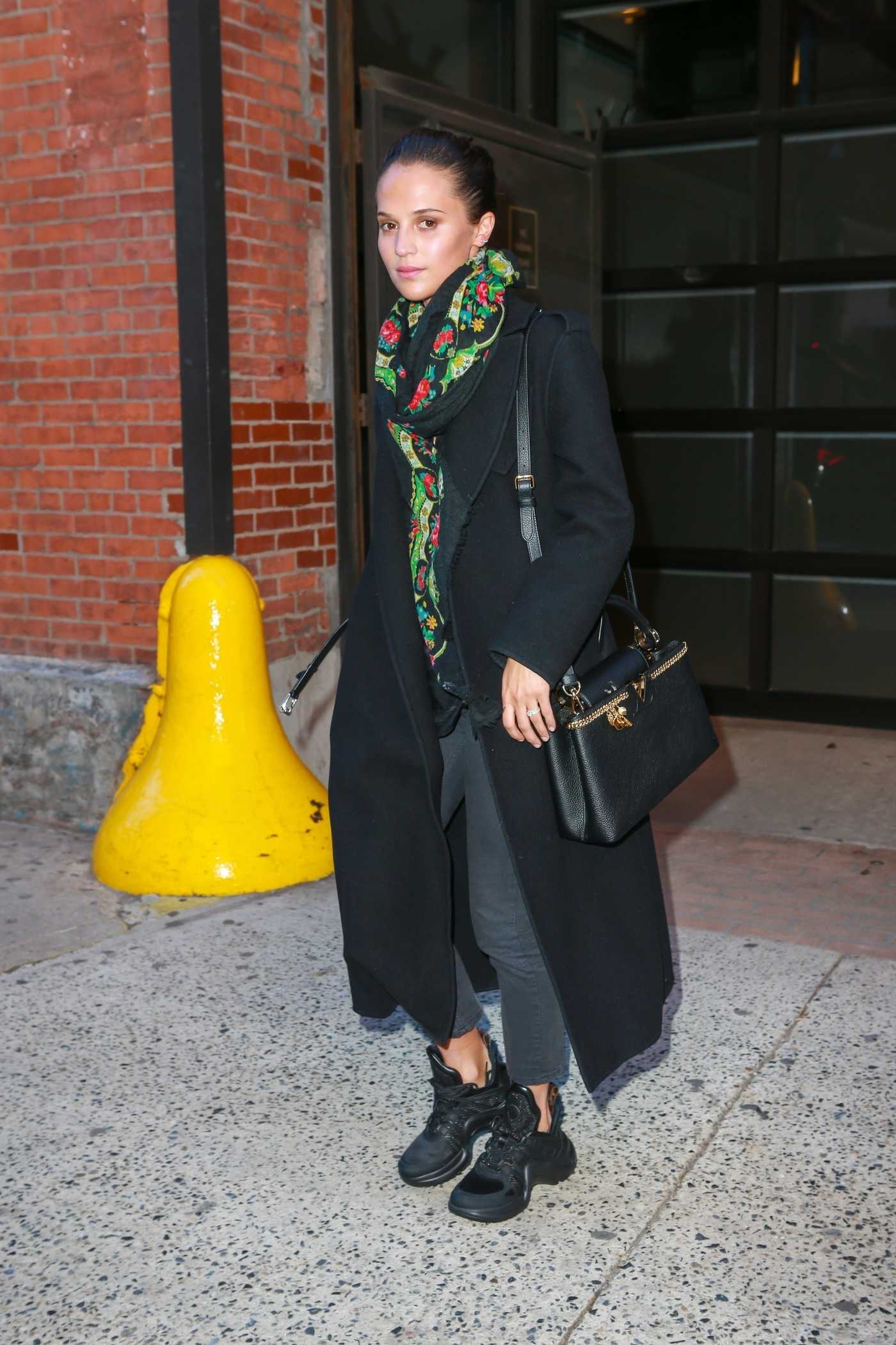 Alicia Vikander in a Black Coat Leaves Highline Stages in NYC 02/18/2019