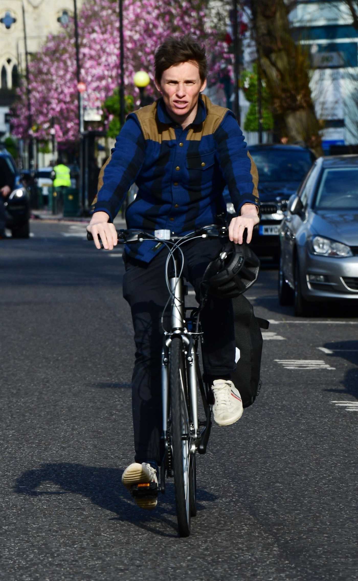 Eddie Redmayne in a White Sneakers Riding His Bicycle in Notting Hill, London 26/03/2019