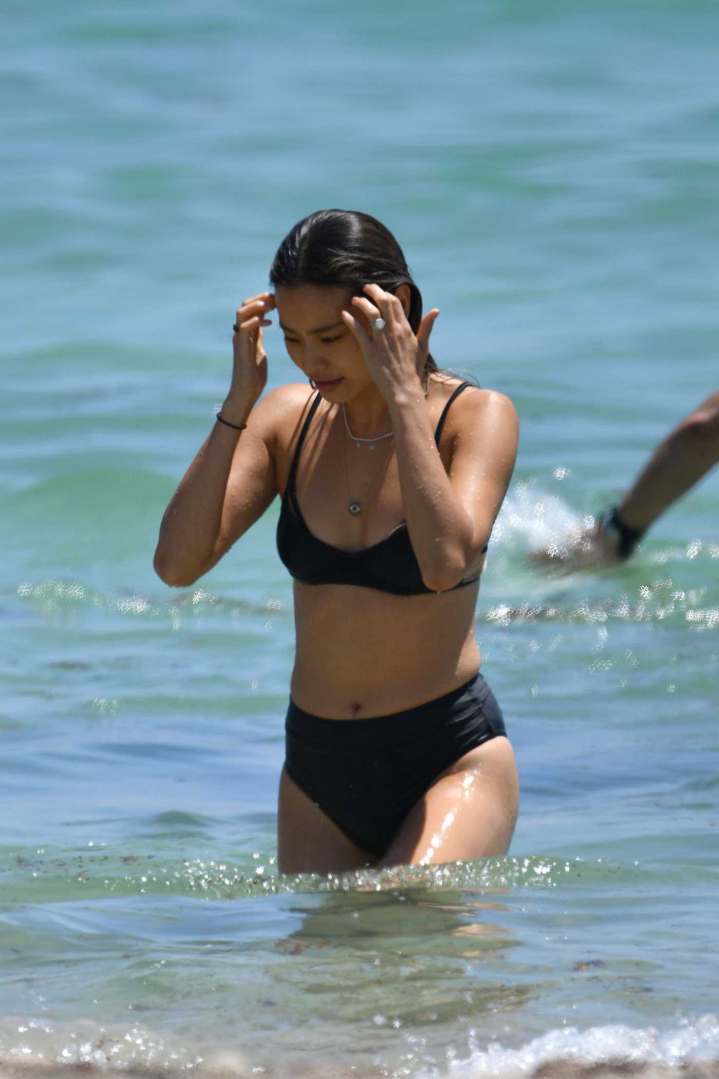 Jamie Chung in a Black Bikini on the Beach in Miami 04/27/2019