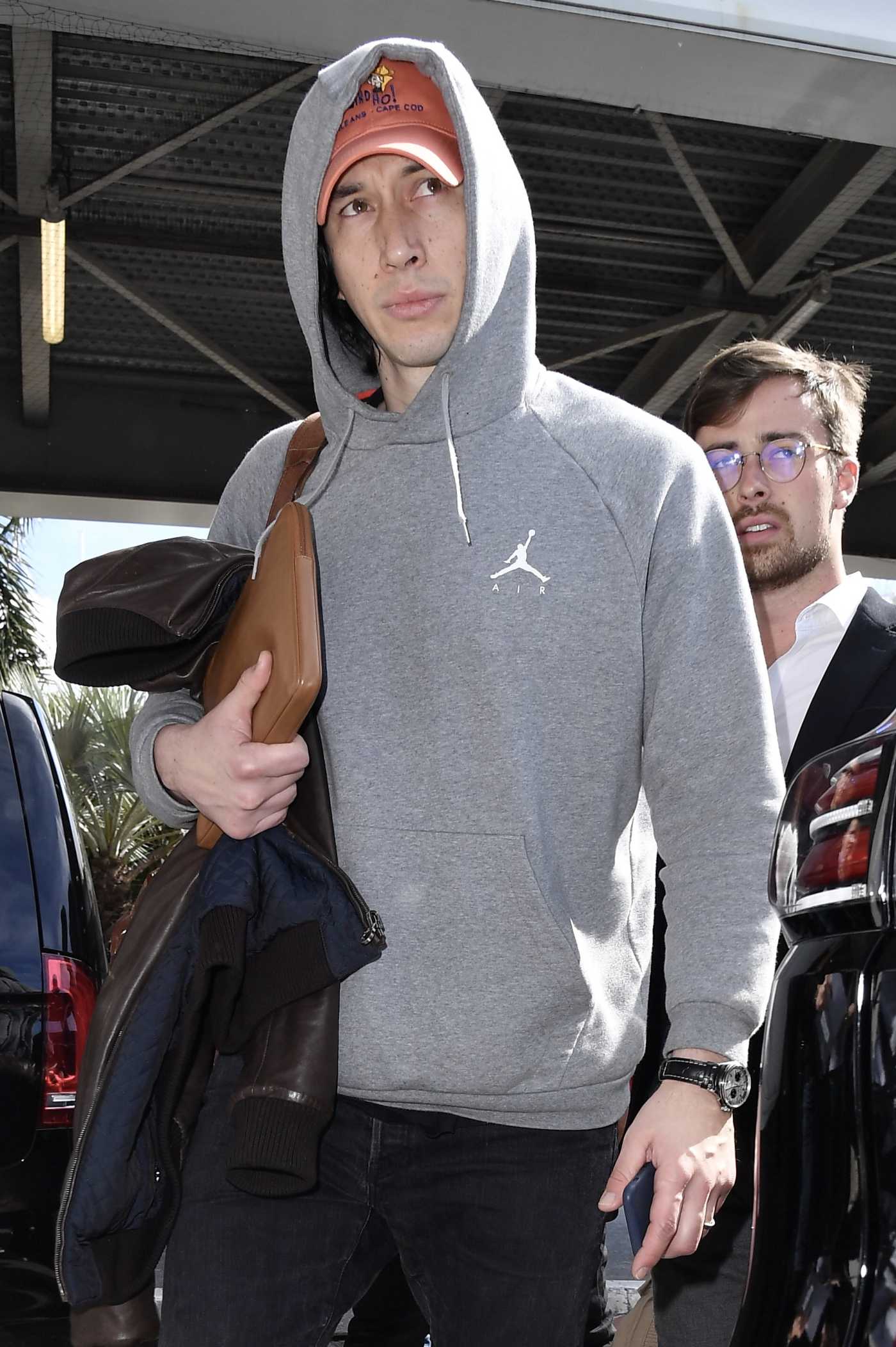 Adam Driver in a Gray Hoody Arrives at Nice Airport in Nice 05/17/2019