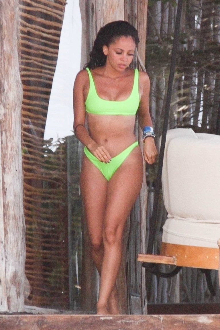 Vanessa Morgan in a Neon Green Bikini