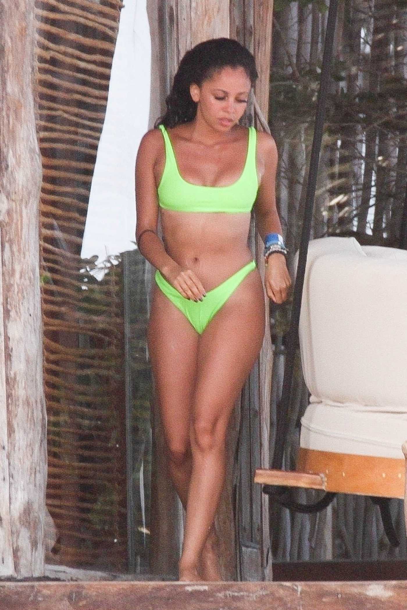 Vanessa Morgan in a Neon Green Bikini on the Beach in Tulum 08/28/2019