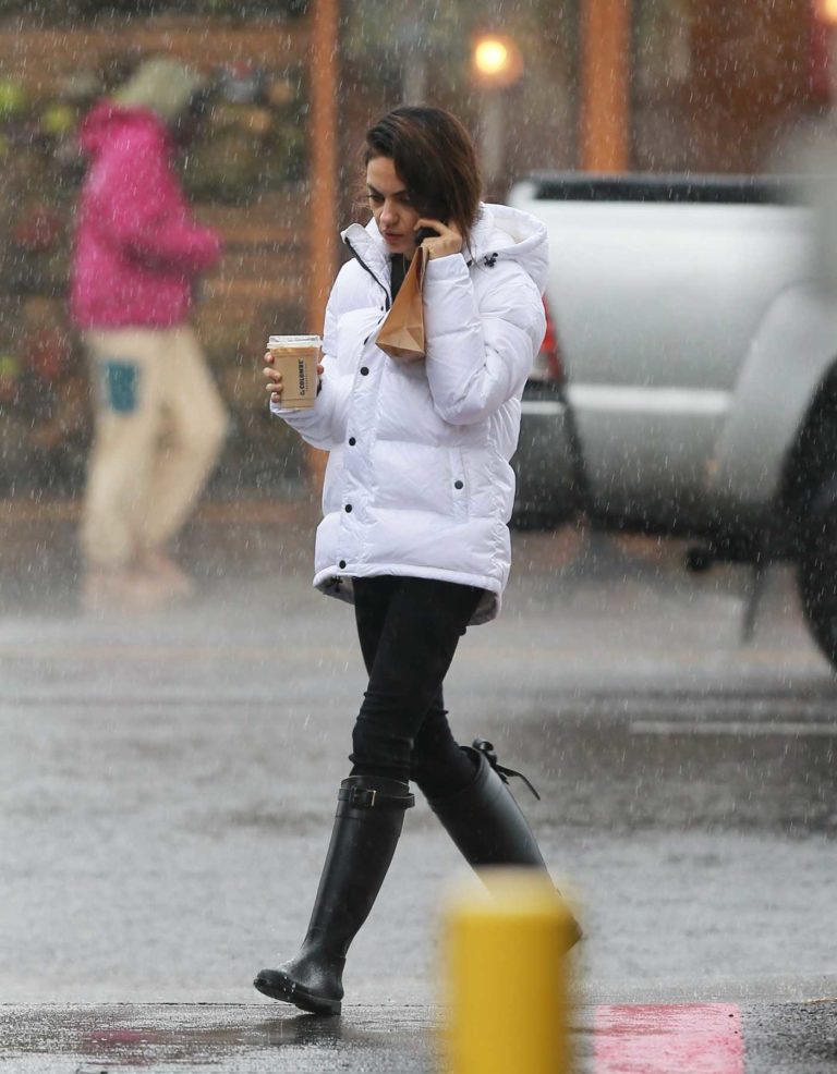 Mila Kunis in a White Puffer Jacket