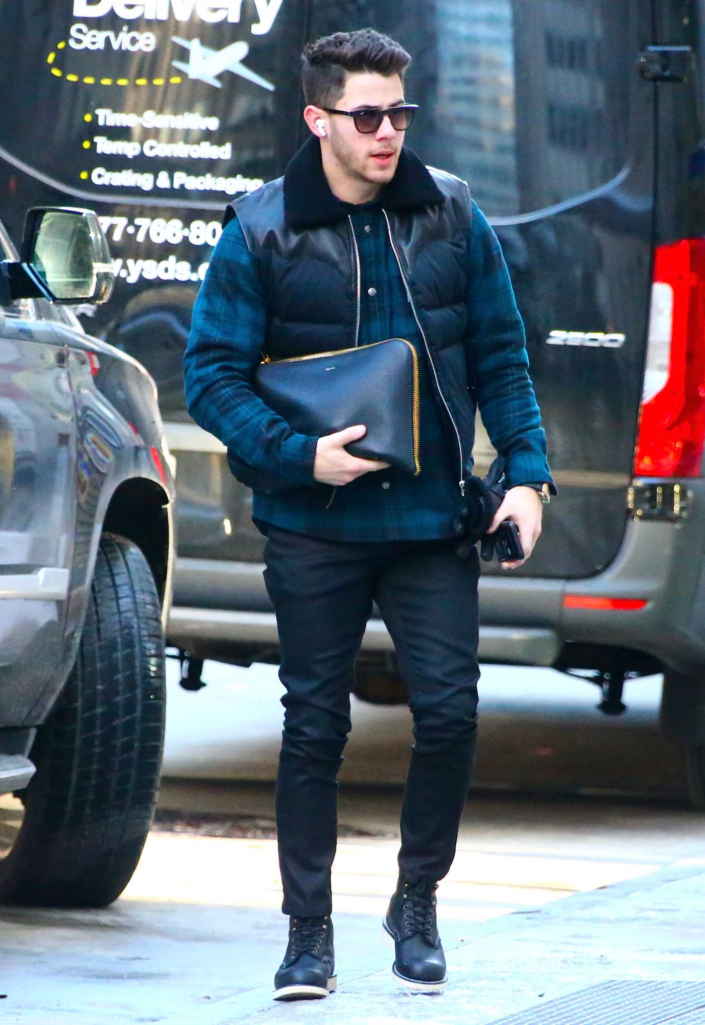 Nick Jonas in a Blue Plaid Shirt Was seen Out in New York 12/03/2019