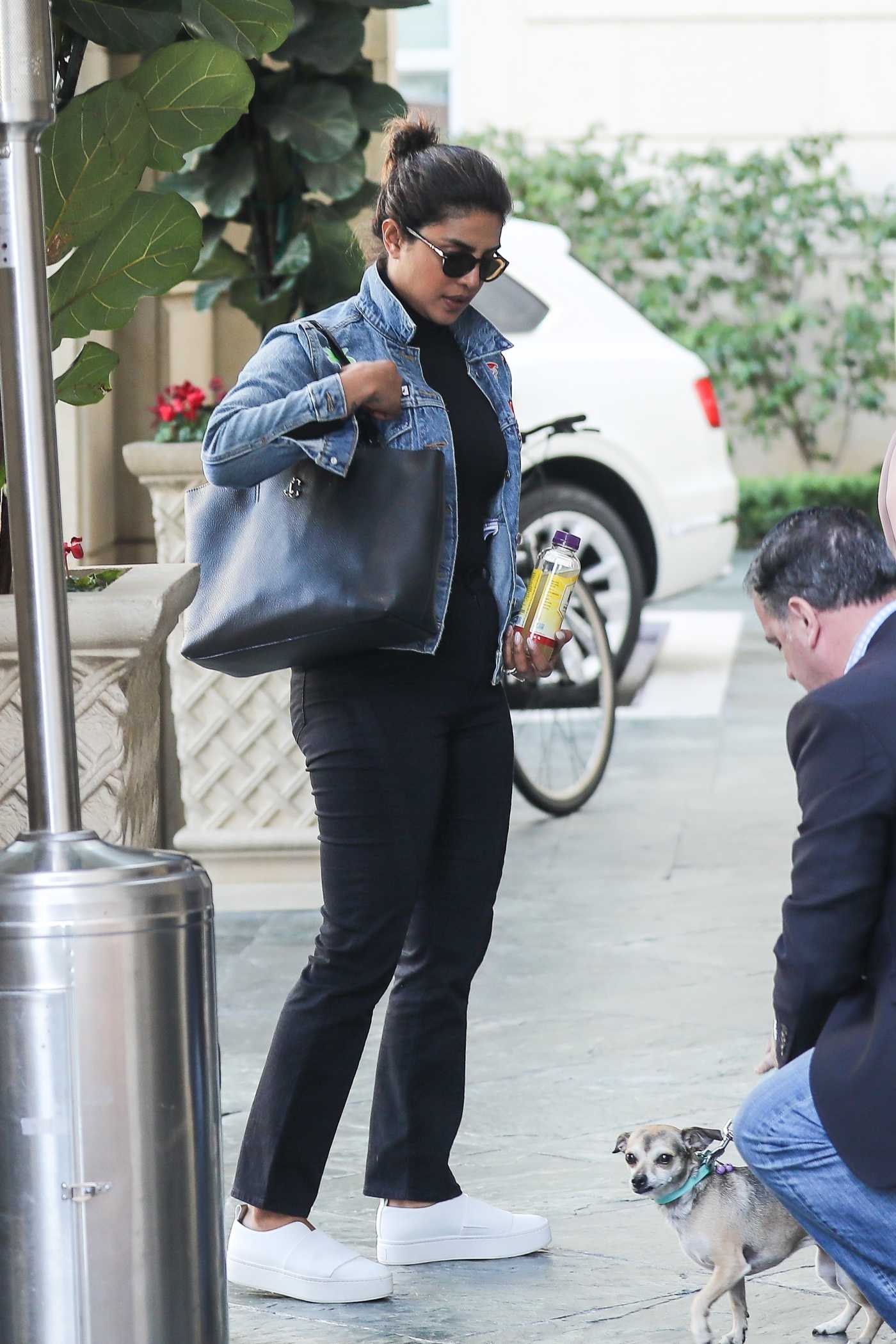 Priyanka Chopra in a Blue Denim Jacket Arrives at the Peninsula in Beverly Hills 01/13/2020