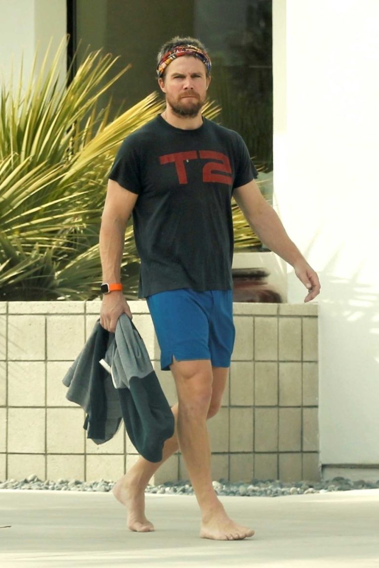 Stephen Amell in a Black Tee