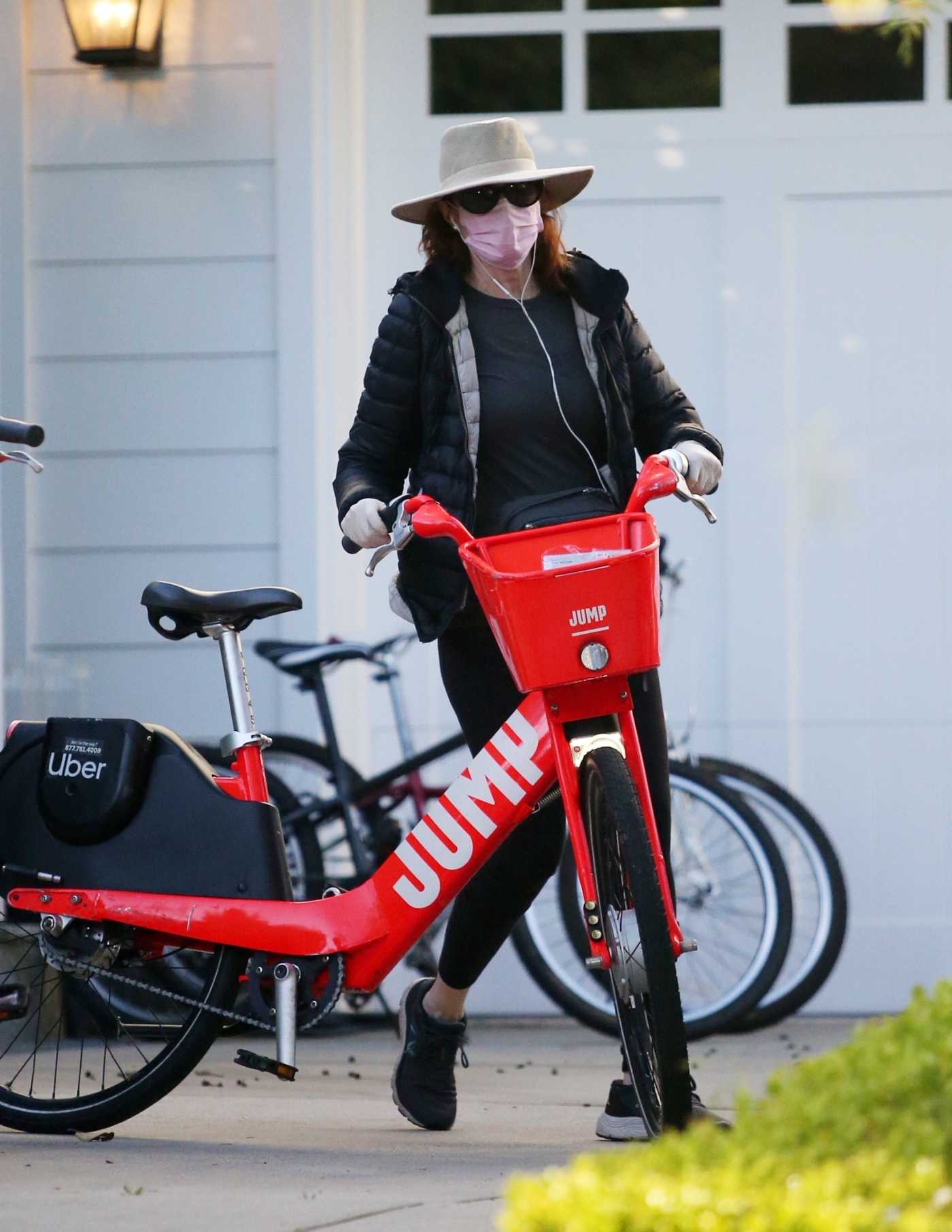 Marcia Cross in a Beige Hat Does a Bike Ride in Santa Monica 04/25/2020