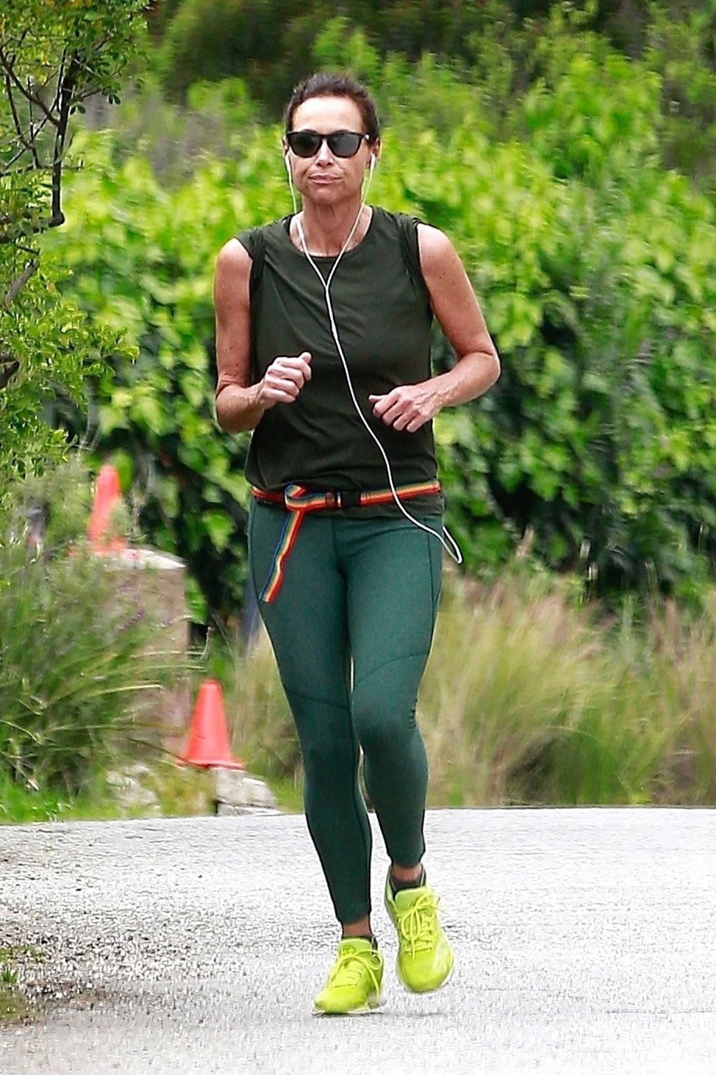 Minnie Driver in a Green Leggings Goes for a Run During the COVID-19 Lockdown in Los Angeles 04/20/2020