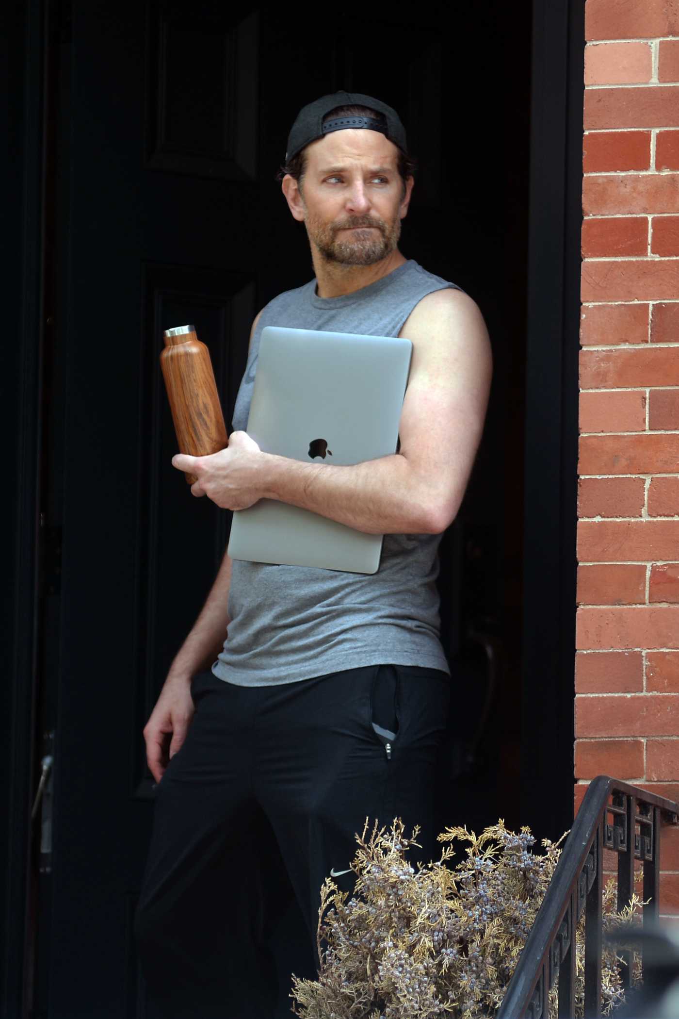 Bradley Cooper in a Black Cap Was Seen Outside His Apartment in New York 05/19/2020