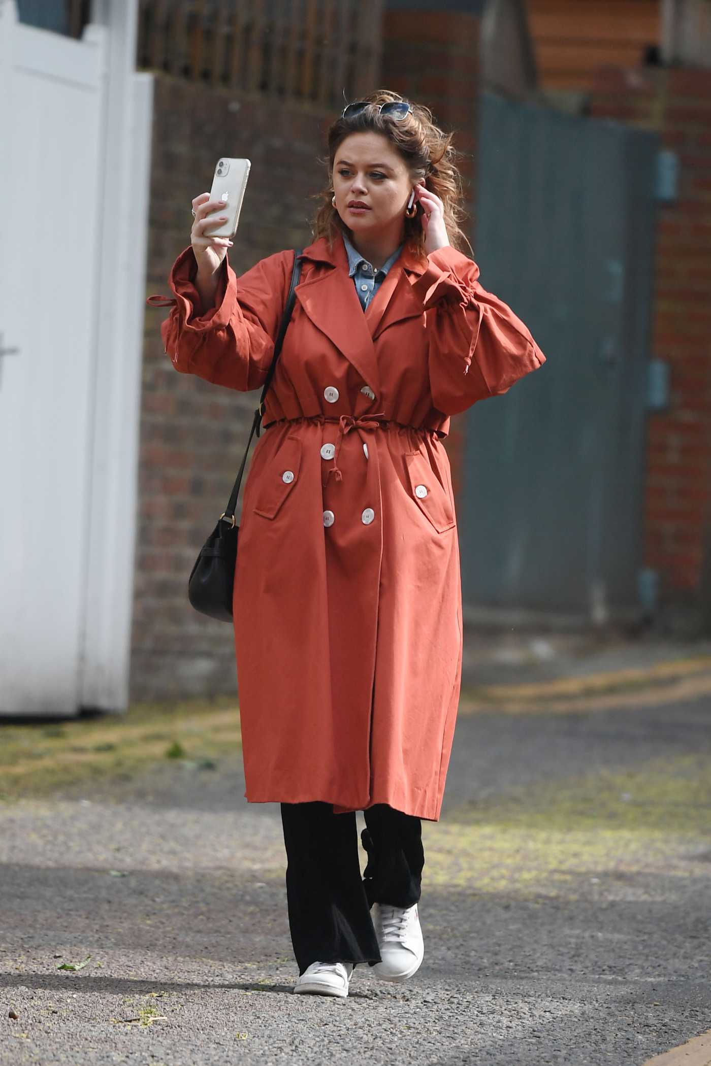 Emily Atack in a Red Trench Coat Was Seen Out in London 05/12/2020