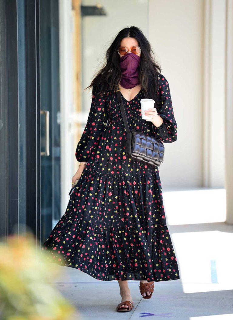 Jessica Gomes in a Black Floral Print Dress