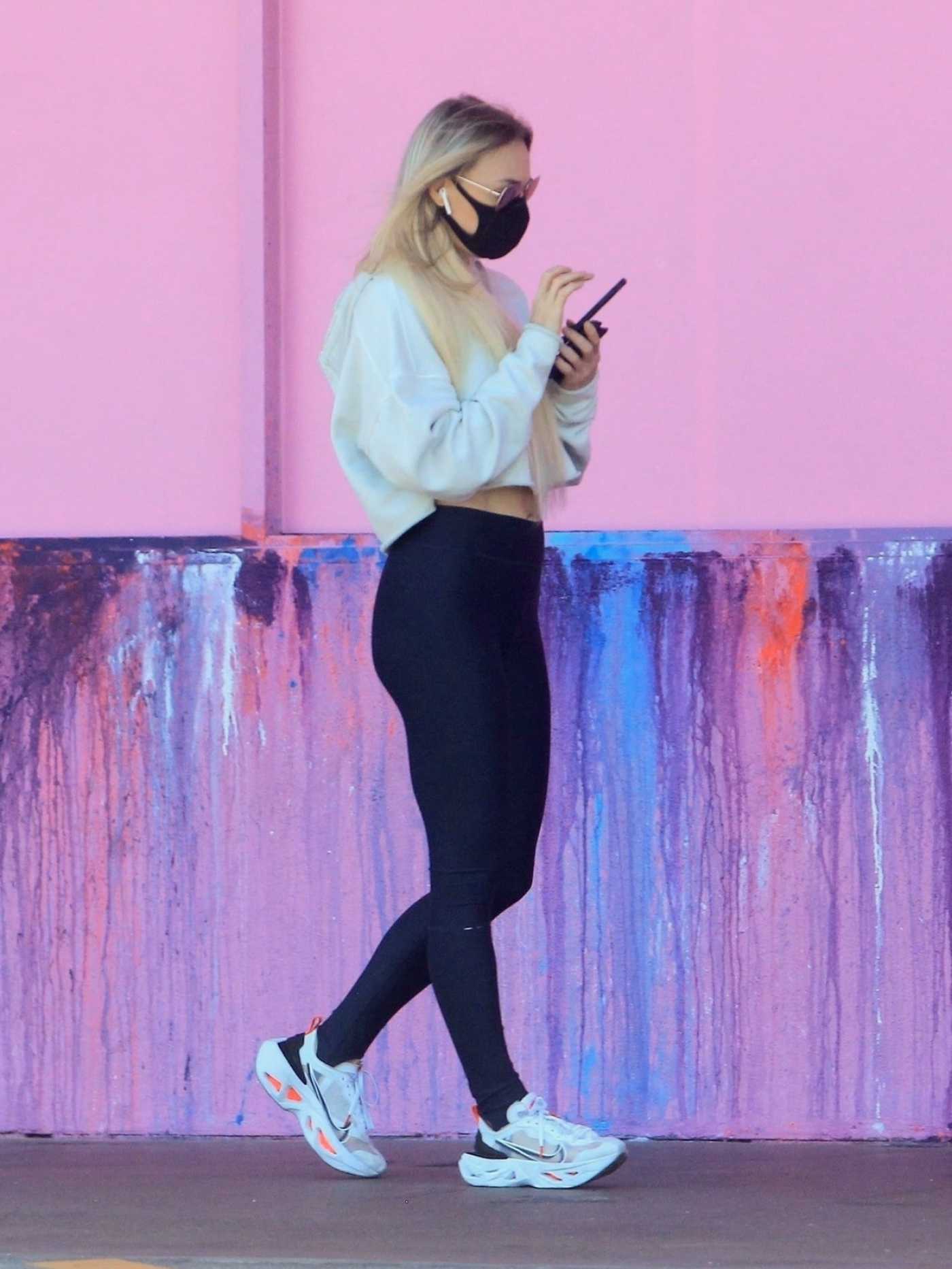 Melissa Ordway in a Black Protective Mask Checks Her Phone Out in West Hollywood 05/11/2020