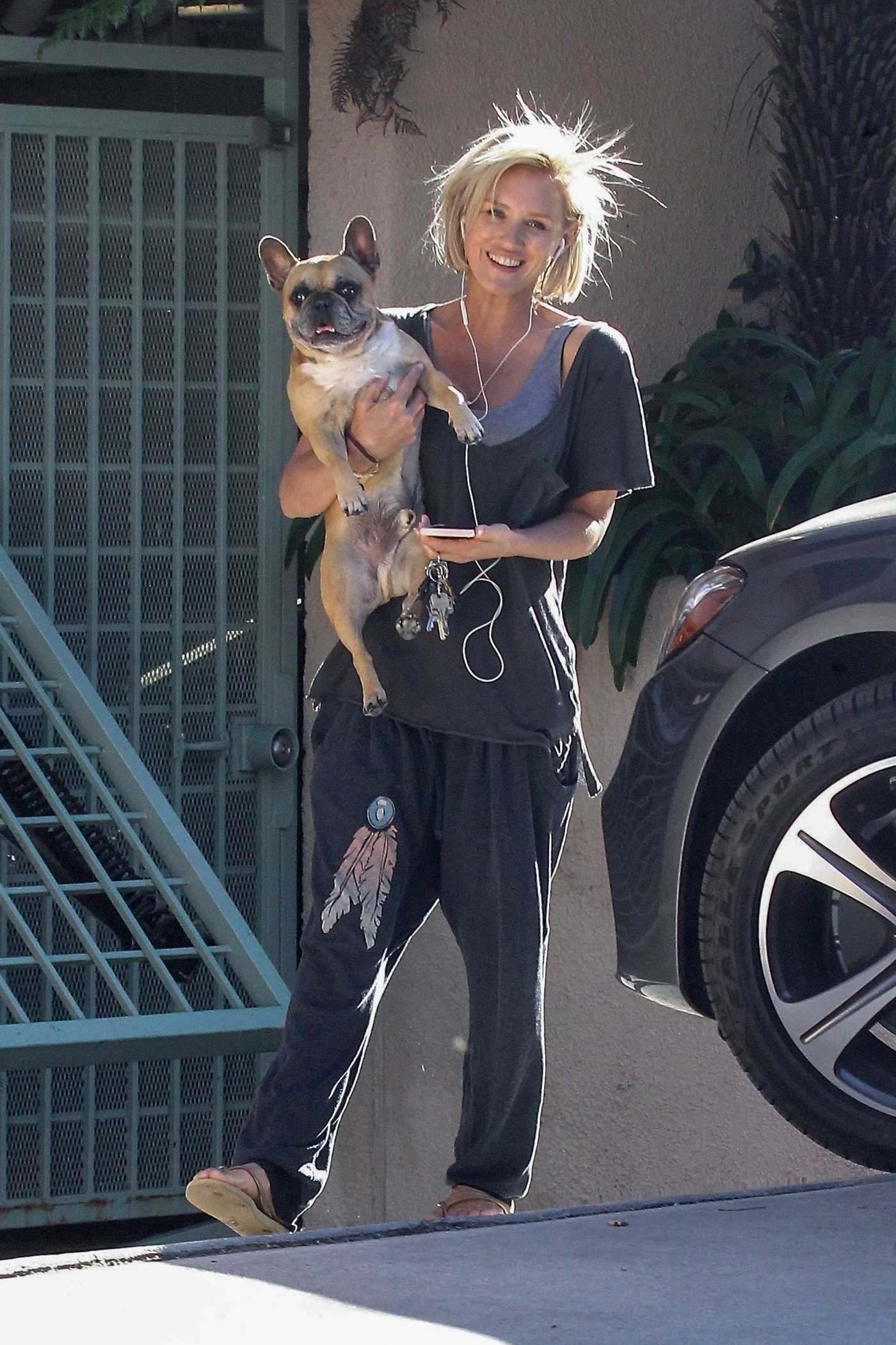 Nicky Whelan in a Gray Sweatpants Walks Her Dog in Sherman Oaks 05/13/2020