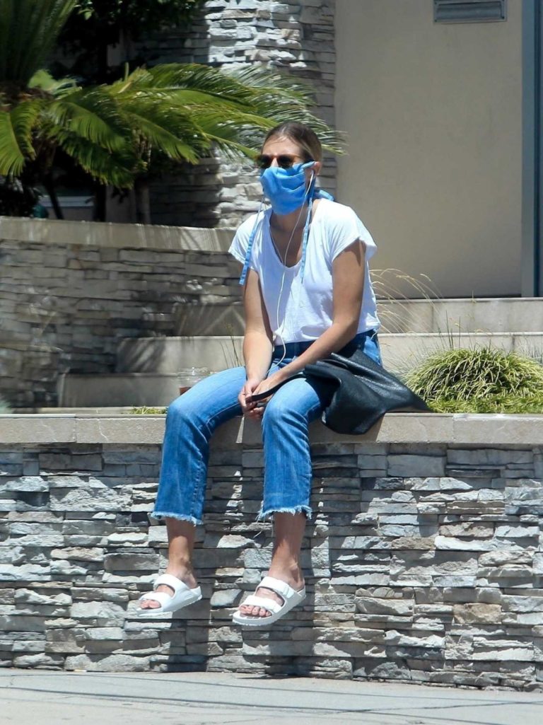 Sara Foster in a Blue Protective Mask