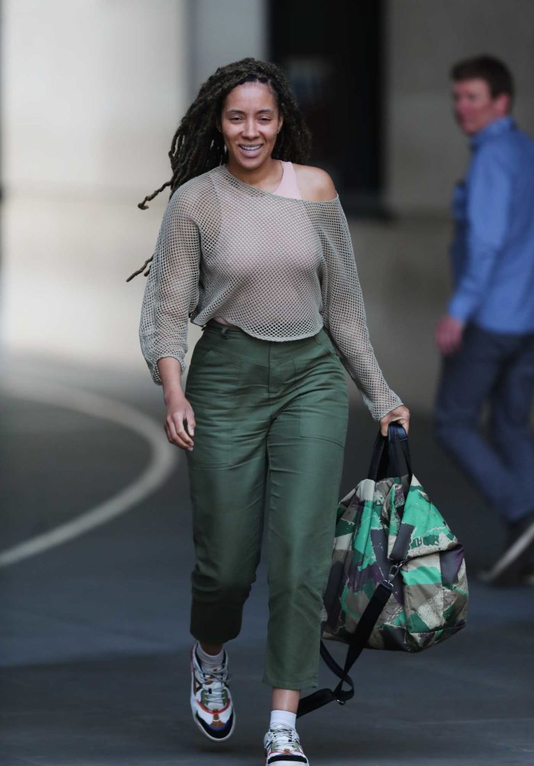 Yasmin Evans in a String Vest Khaki Trousers