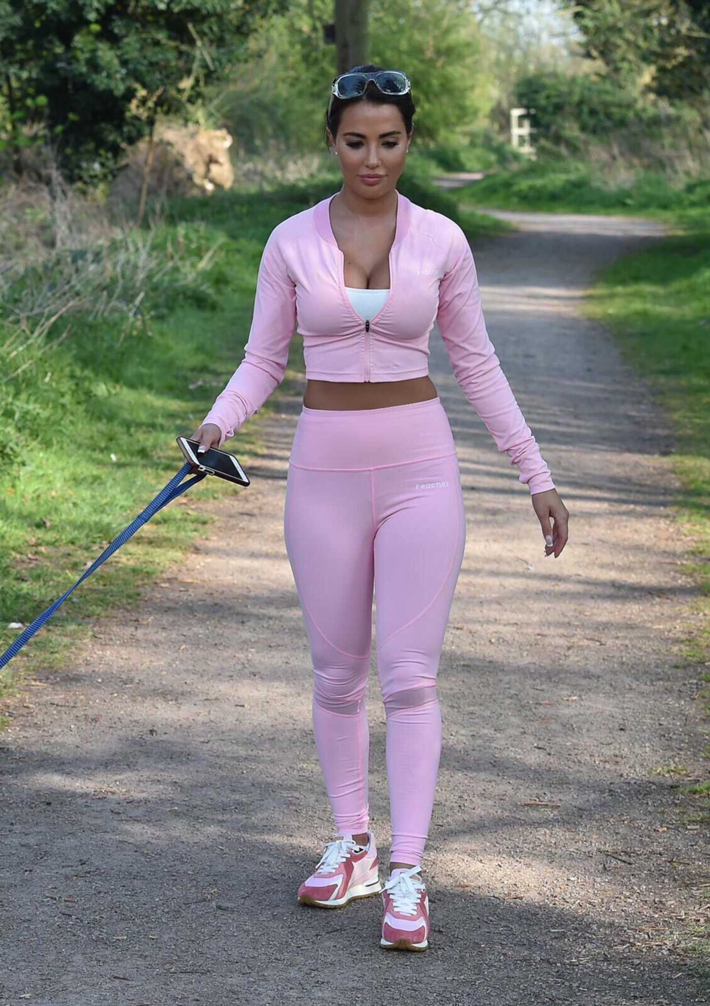 Yazmin Oukhellou in a Pink Workout Clothes Walks Her Dogs in Essex 05/02/2020