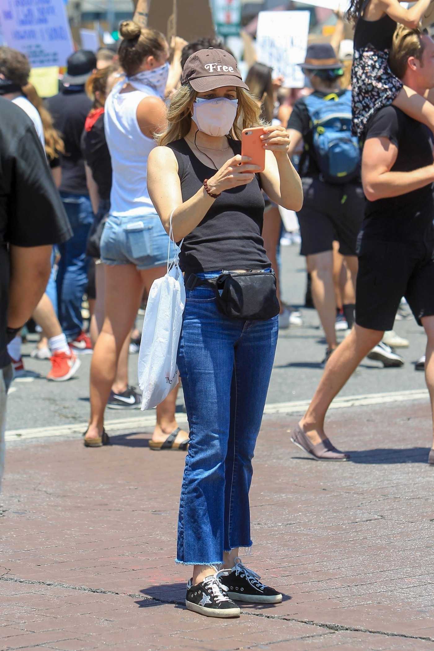 Ambyr Childers in a Black Top Snaps Pictures on Her Phone During the Black Lives Matter Protest in West Hollywood 06/03/2020