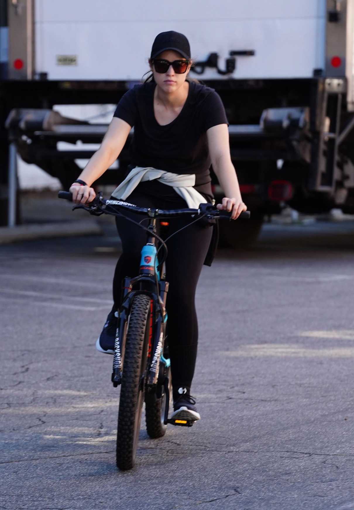 Christina Schwarzenegger in a Black Cap Does a Bike Ride in Brentwood 06/09/2020