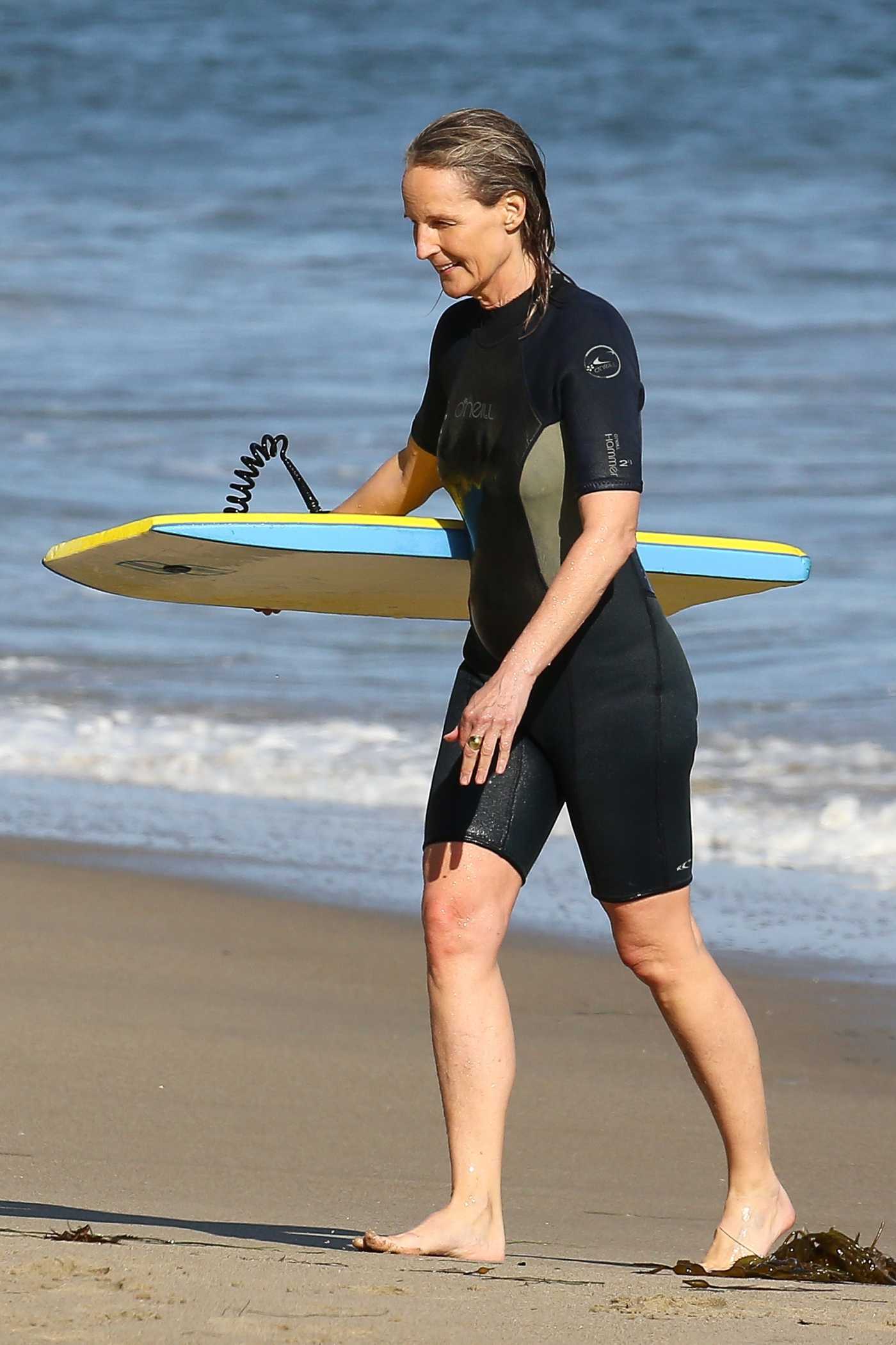 Helen Hunt Enjoys Her Morning with a Bodyboarding Session on the Beach in Malibu 06/13/2020