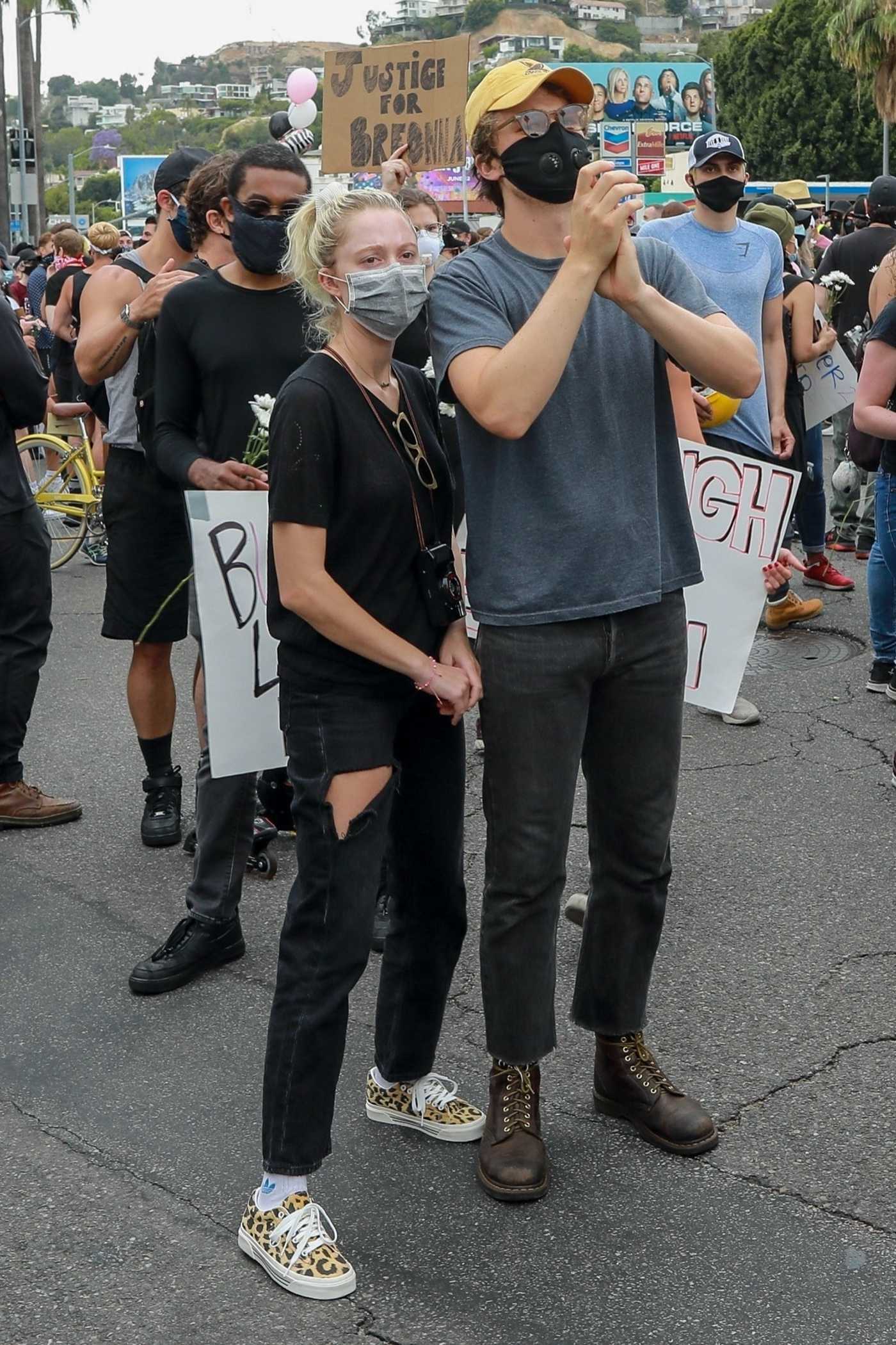 Maika Monroe in a Black Tee Joins the the Black Lives Matter Protest in Los Angeles 06/05/2020