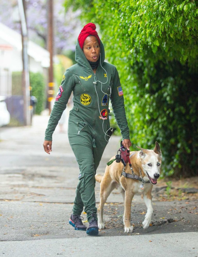 Regina King in a Green Coverall