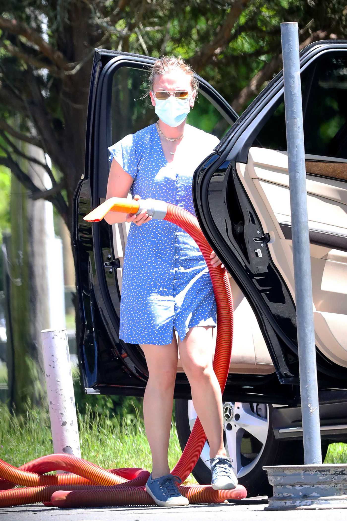 Scarlett Johansson in a Light Blue Summer Dress Cleans Her SUV in The Hamptons 06/08/2020