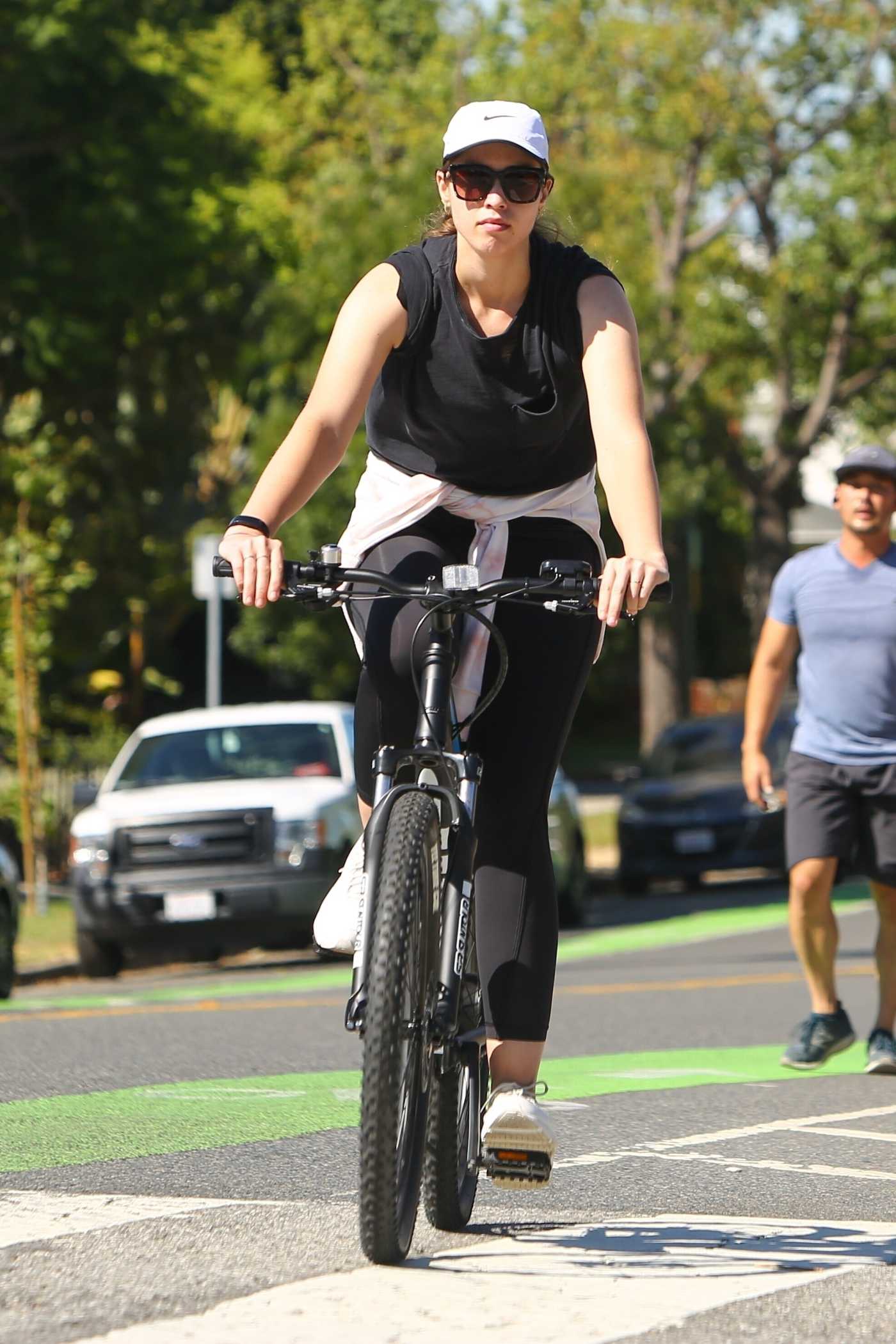 Christina Schwarzenegger in a White Cap Does a Bike Ride in Brentwood 07/27/2020