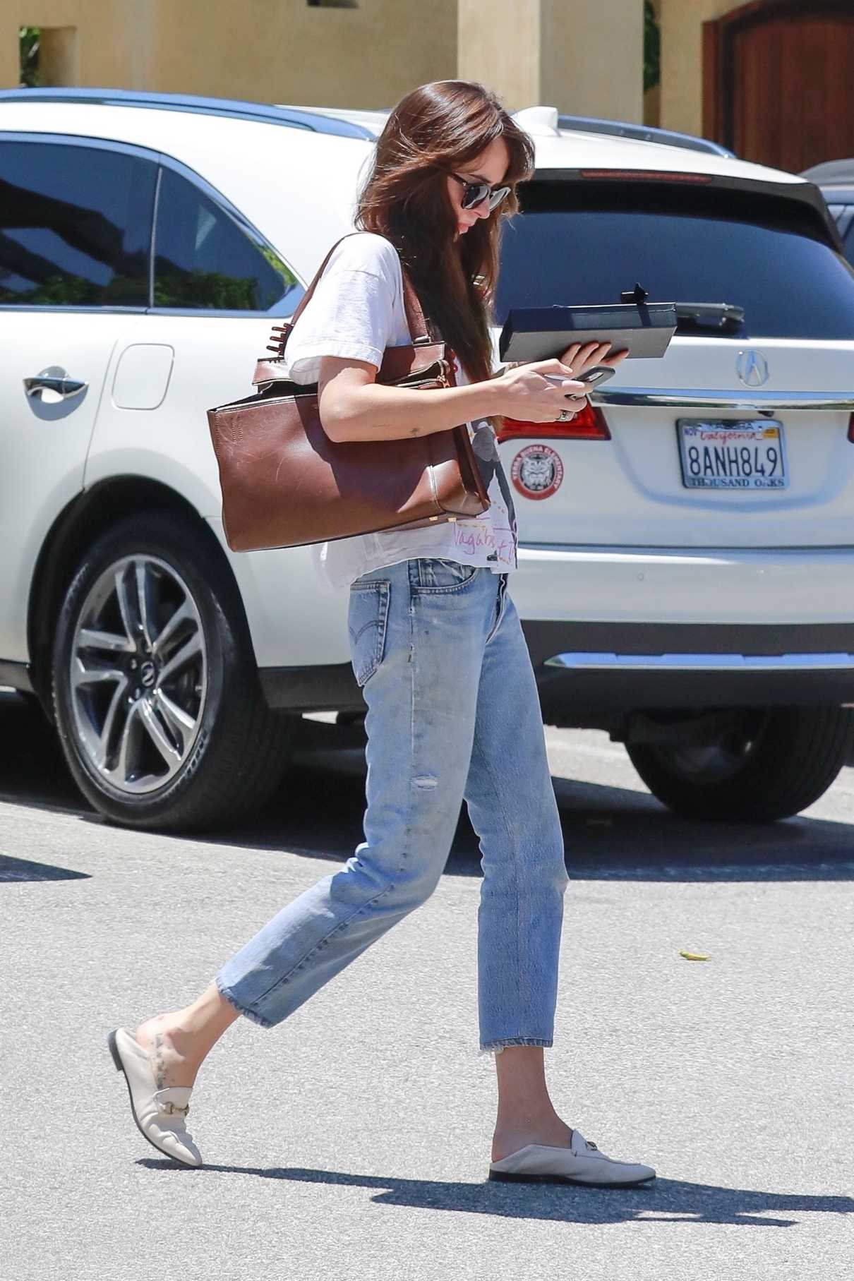 Dakota Johnson in a Blue Jeans Visits Her Doctor in Los Angeles 07/13/2020