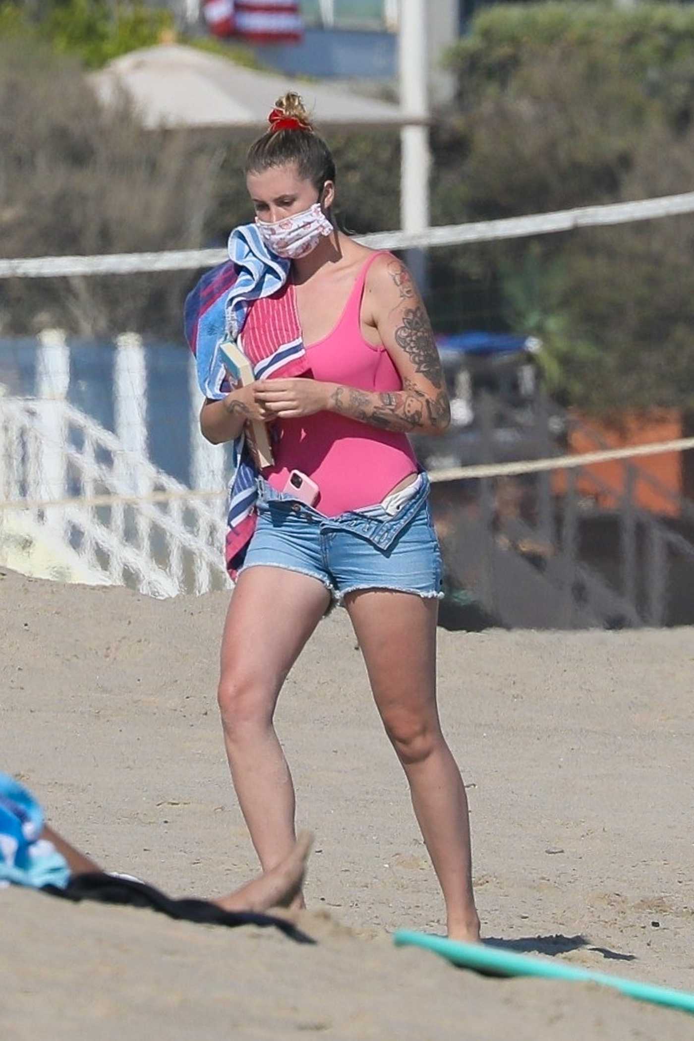 Ireland Baldwin in a Pink Swimsuit on the Beach in Malibu 07/20/2020