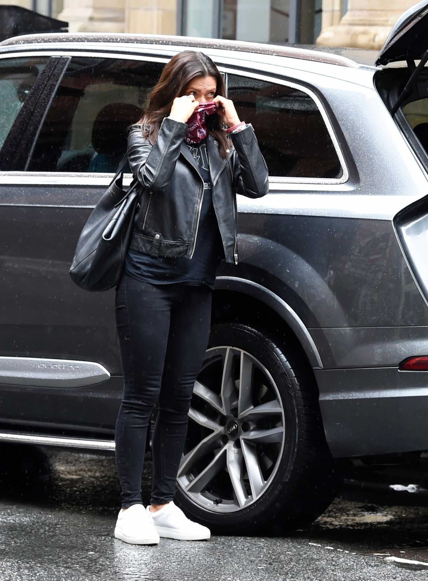 Kym Marsh in a Black Leather Jacket Arrives at the House of Evelyn Hair and Beauty Out with Her New Boyfriend in Manchester 07/18/2020