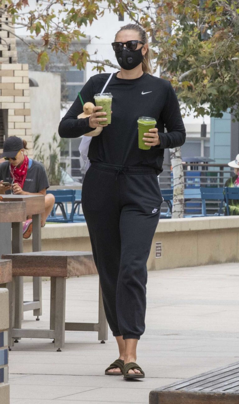 Maria Sharapova in a Black Protective Mask