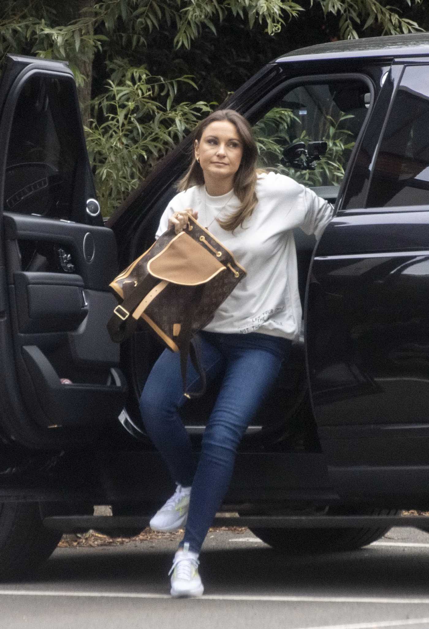 Sam Faiers in a White Sweatshirt Arrives on the Set of The Mummy Diaries in London 08/17/2020