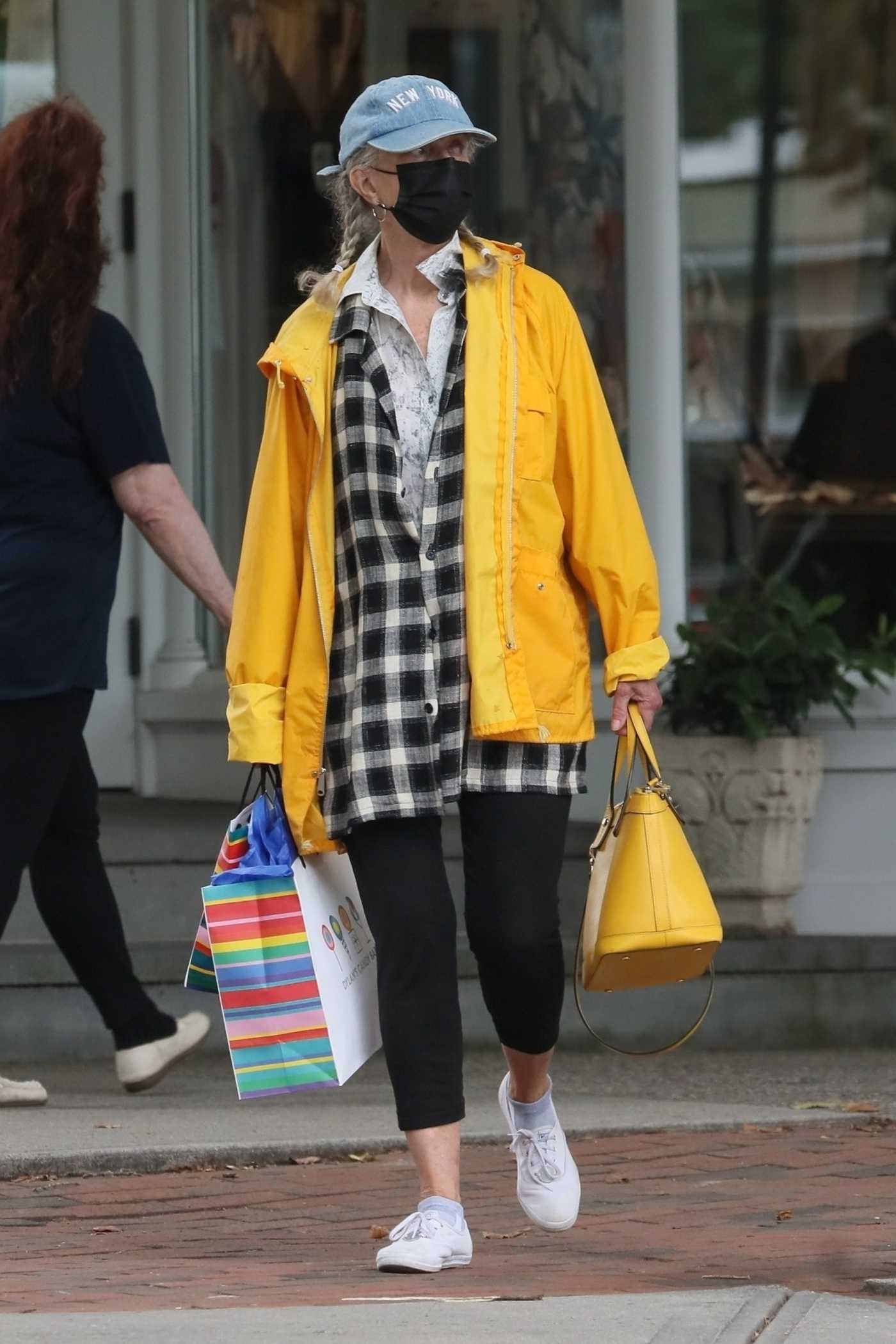 Blythe Danner in a Yellow Windbreaker Goes Shopping in the Hamptons, NYC 09/09/2020