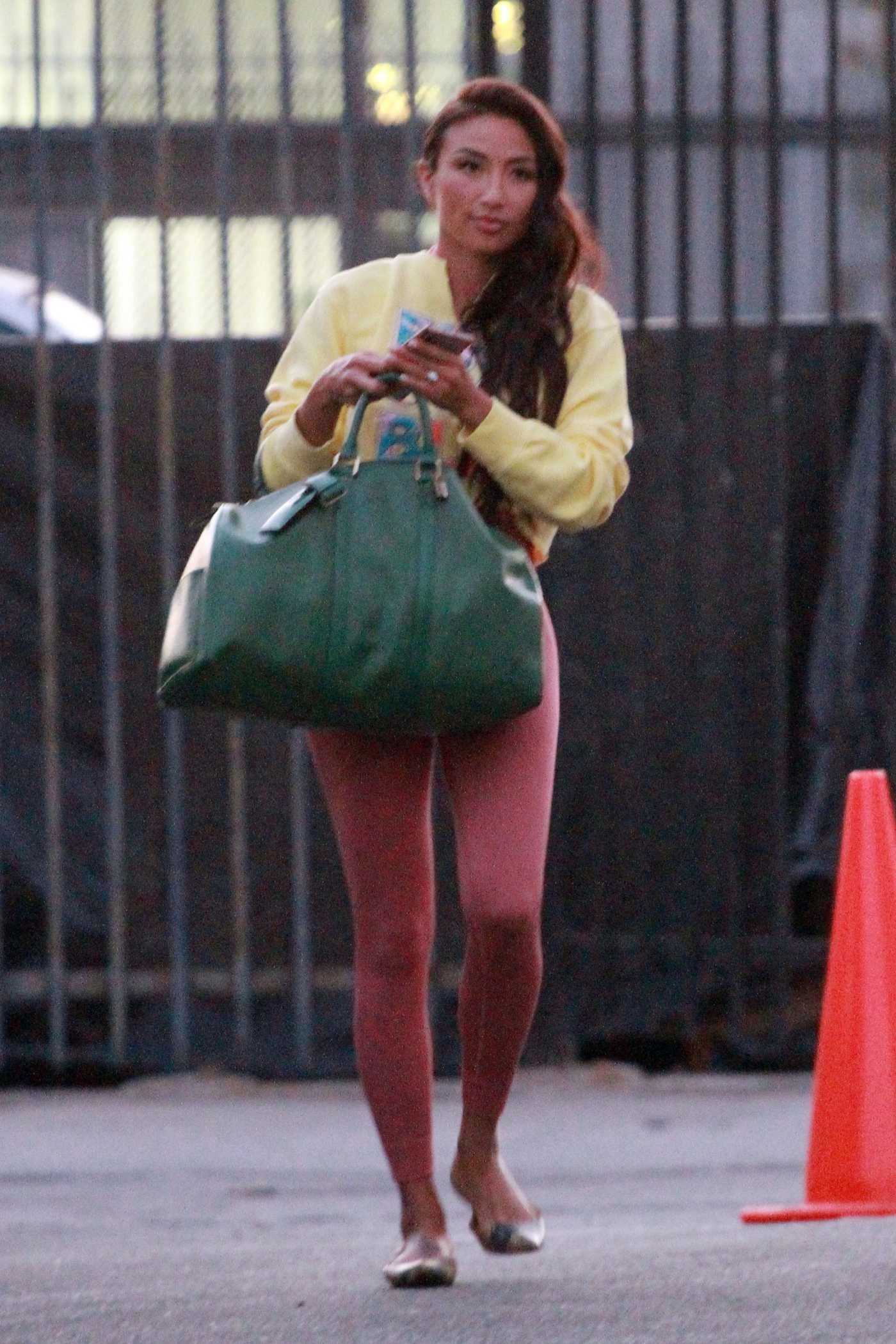 Jeannie Mai in a Red Leggings Arrives at the DWTS Studio in Los Angeles 09/24/2020