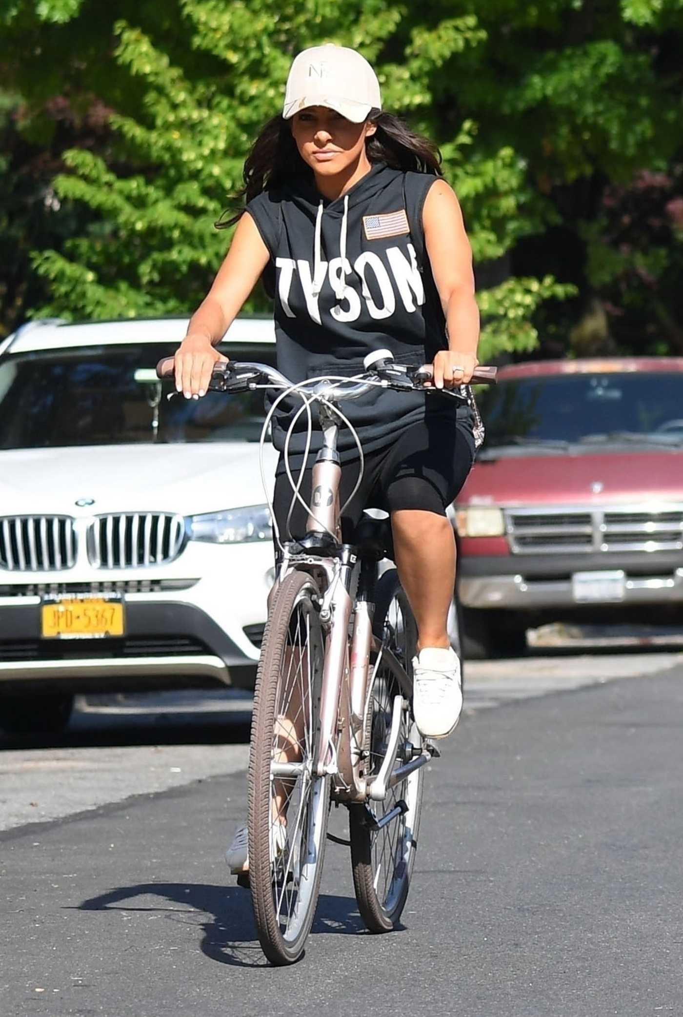 Roxanne Pallett in a White Sneakers Does a Bike Ride in New York 09/28/2020