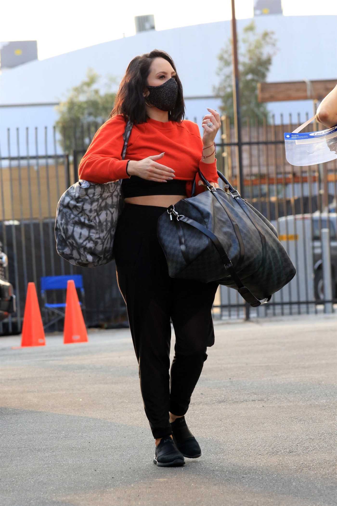 Cheryl Burke in a Red Cropped Sweatshirt Heads to the DWTS Studio in Los Angeles 10/08/2020