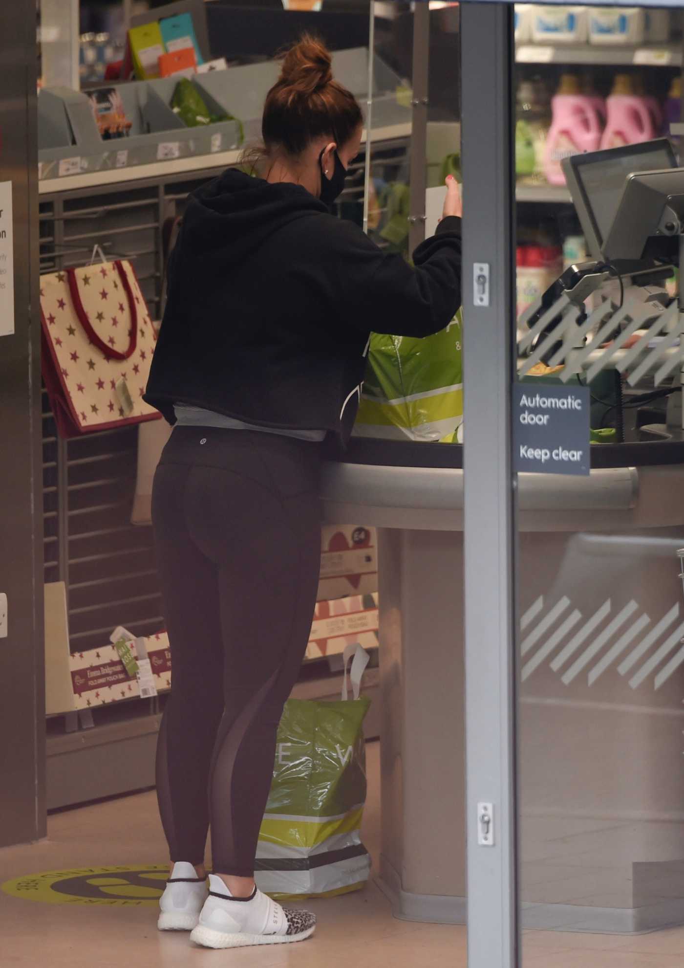 Coleen Rooney in a Black Leggings Grabs a Coffee Out in Cheshire 09/29