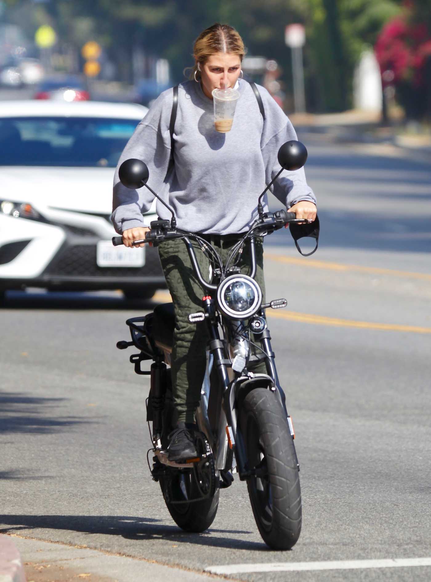 Emma Slater in a Grey Sweatshirt Takes Her Electric Bike Out for a Coffee Run in Studio City 10/19/2020
