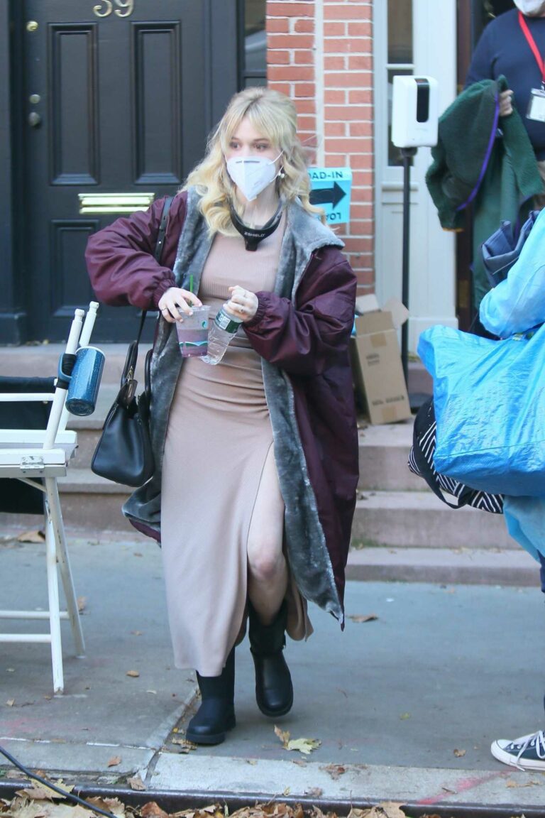 Emily Alyn Lind in a Protective Mask