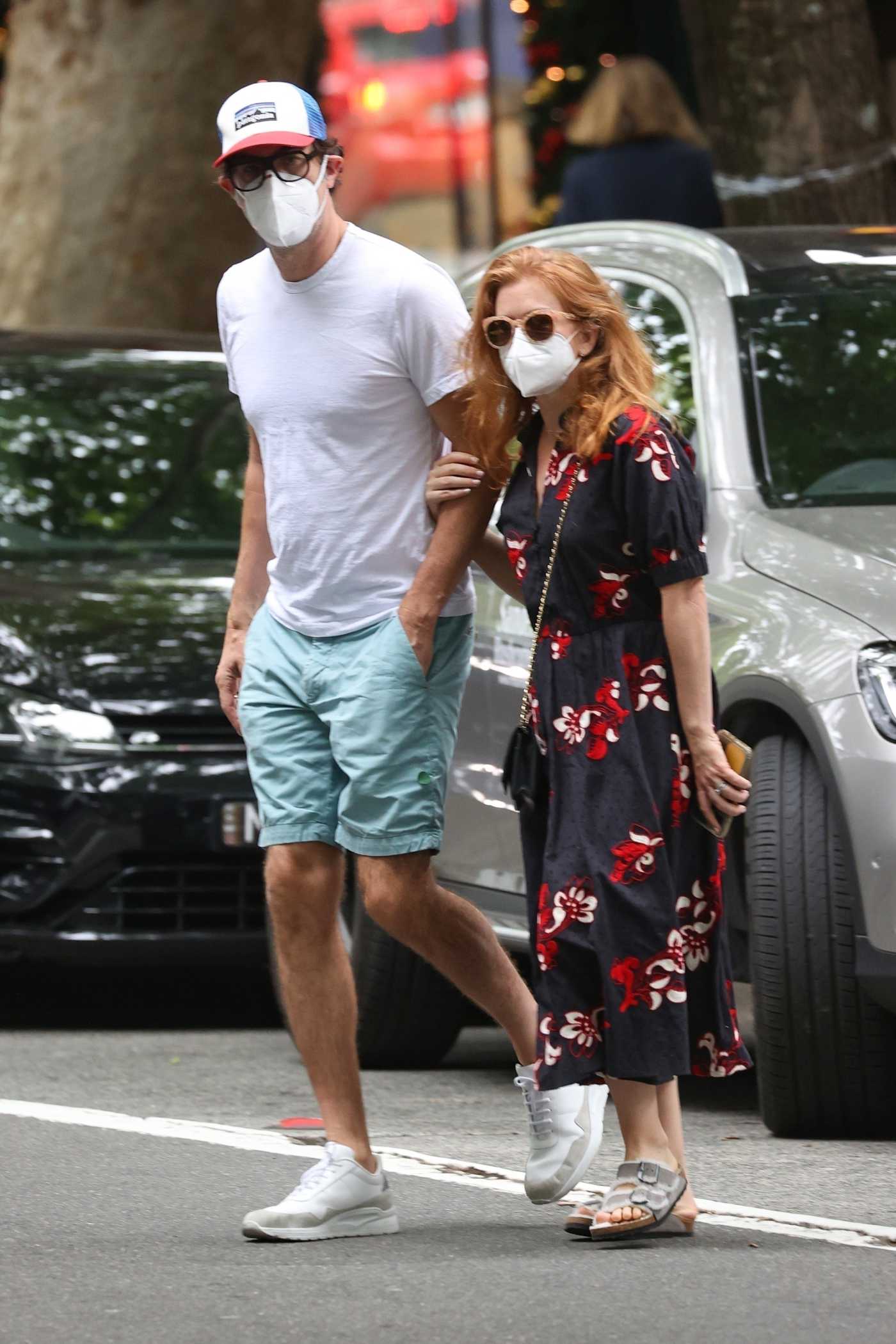 Isla Fisher in a Black Floral Dress Was Seen Out with Sacha Baron Cohen in Sydney 11/27/2020