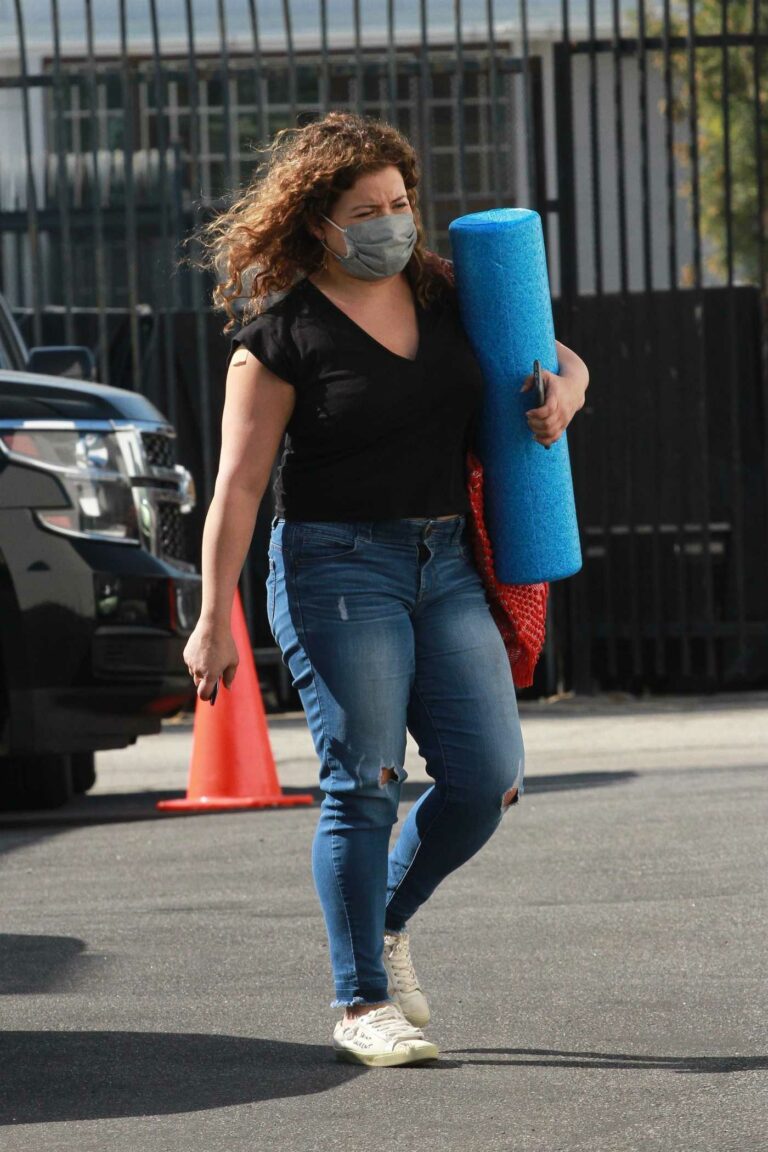 Justina Machado in a Blue Ripped Jeans