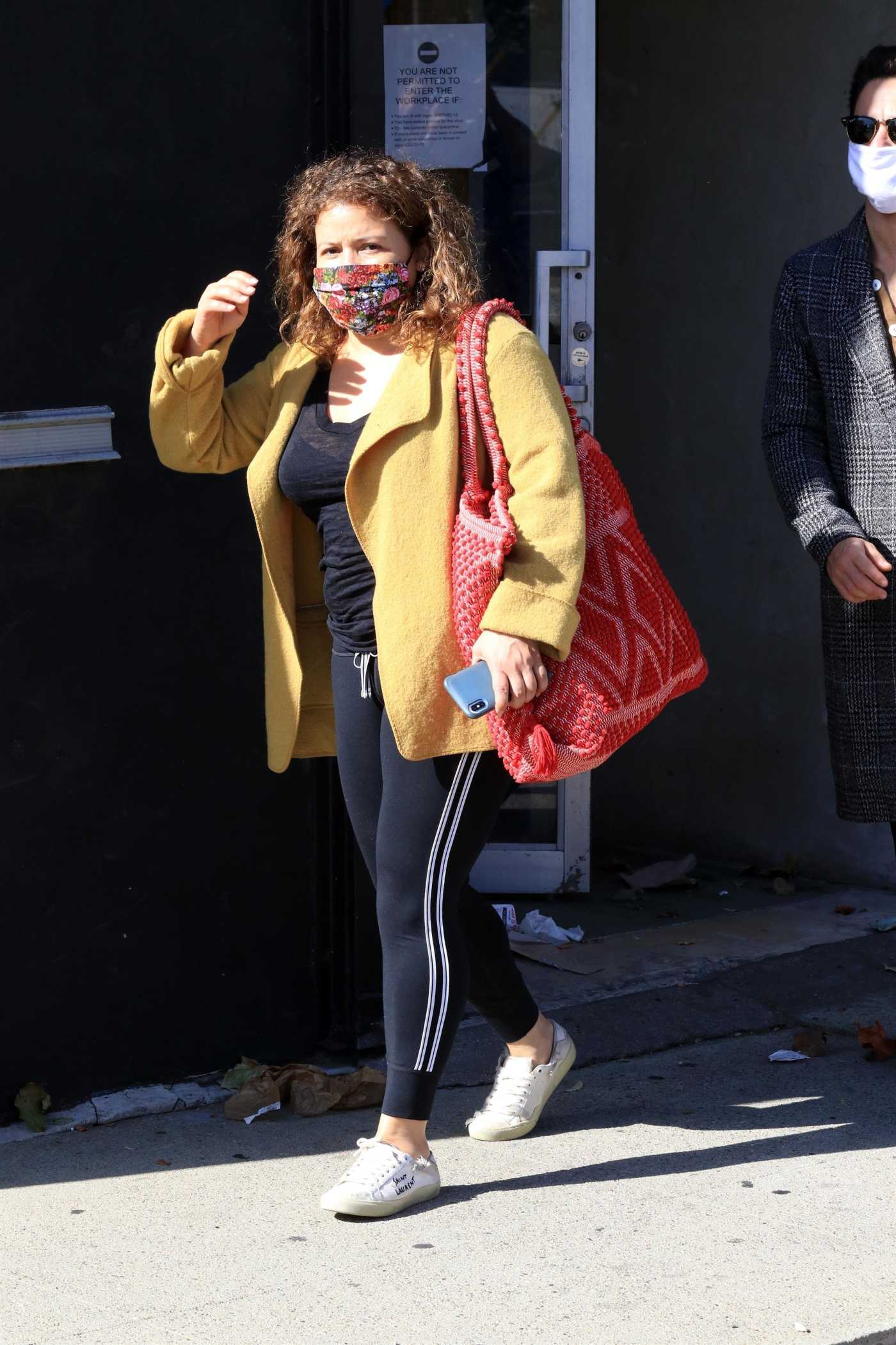 Justina Machado in a Yellow Cardigan Leaves the DWTS Studio in Los Angeles 11/08/2020