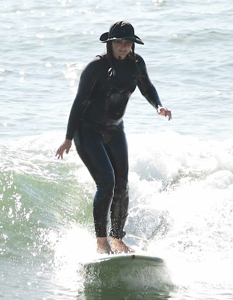 Leighton Meester in a Black Wetsuit