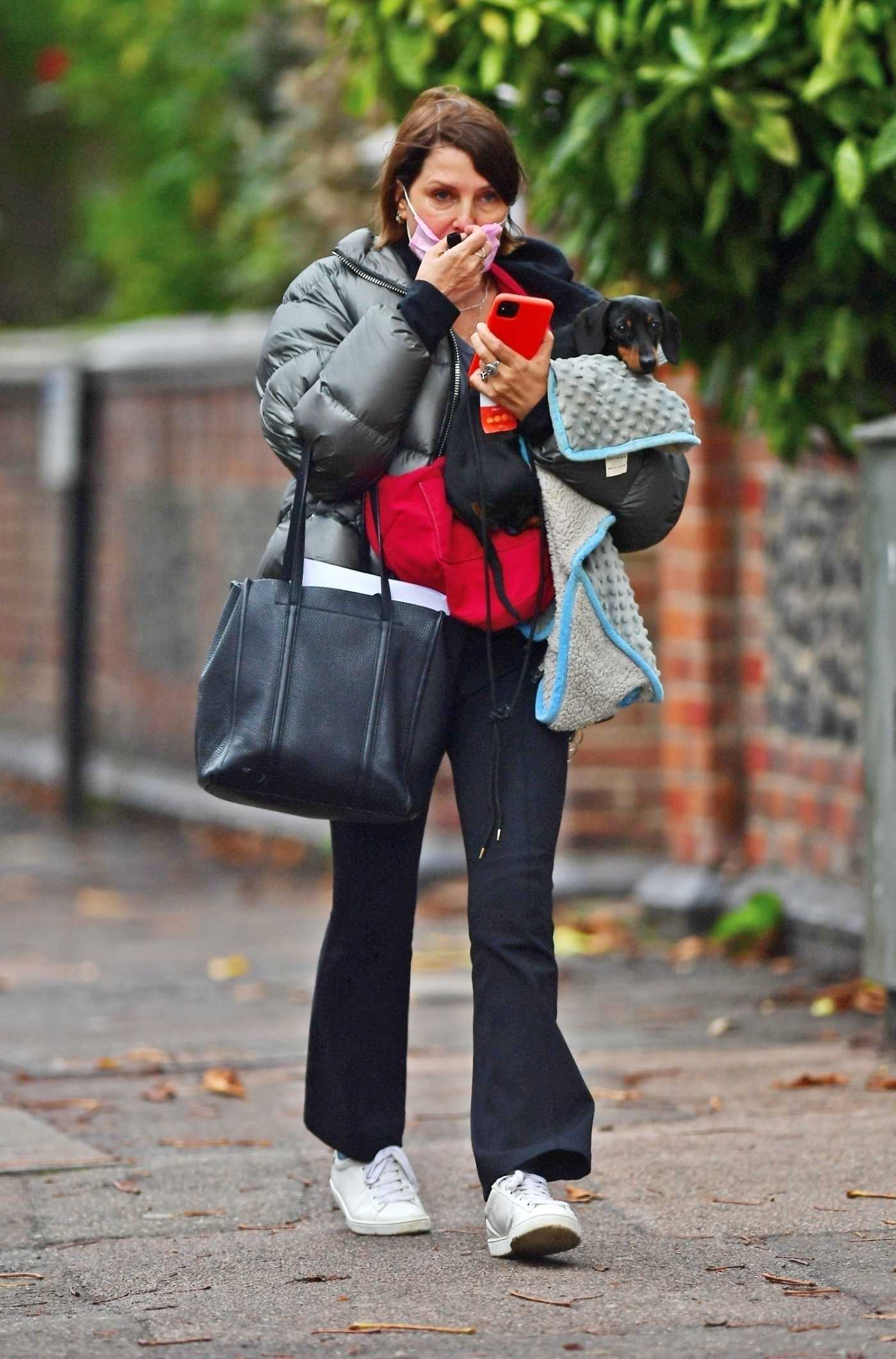 Sadie Frost in a White Sneakers Was Seen Out with Her Puppy in North London 11/13/2020