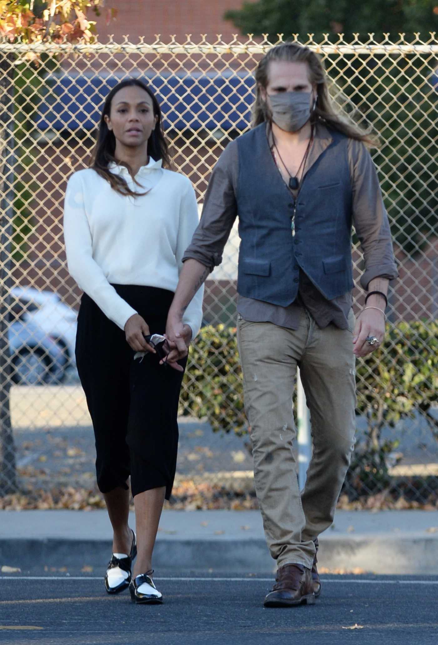 Zoe Saldana in a Black Skirt Was Seen Out with Her Husband Marco Perego in Los Angeles 11/17/2020