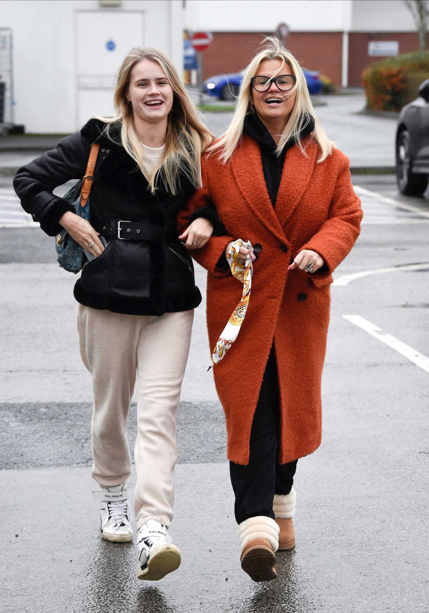 Kerry Katona in a Red Coat Goes Shopping with Her Daughter Lily-Sue at Tesco in Warrington 12/02/2020