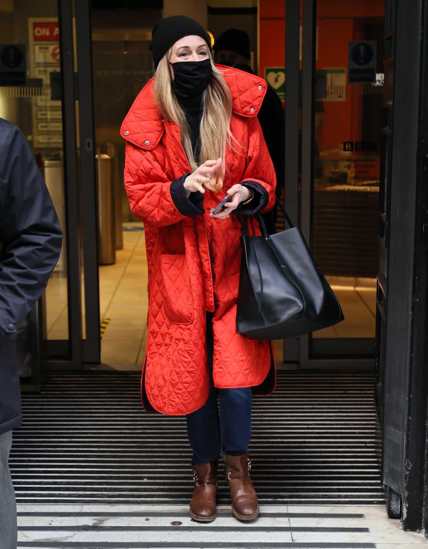 Cat Deeley in a Red Puffer Coat Leaves Her BBC Radio 2 Show in London 01/02/2021