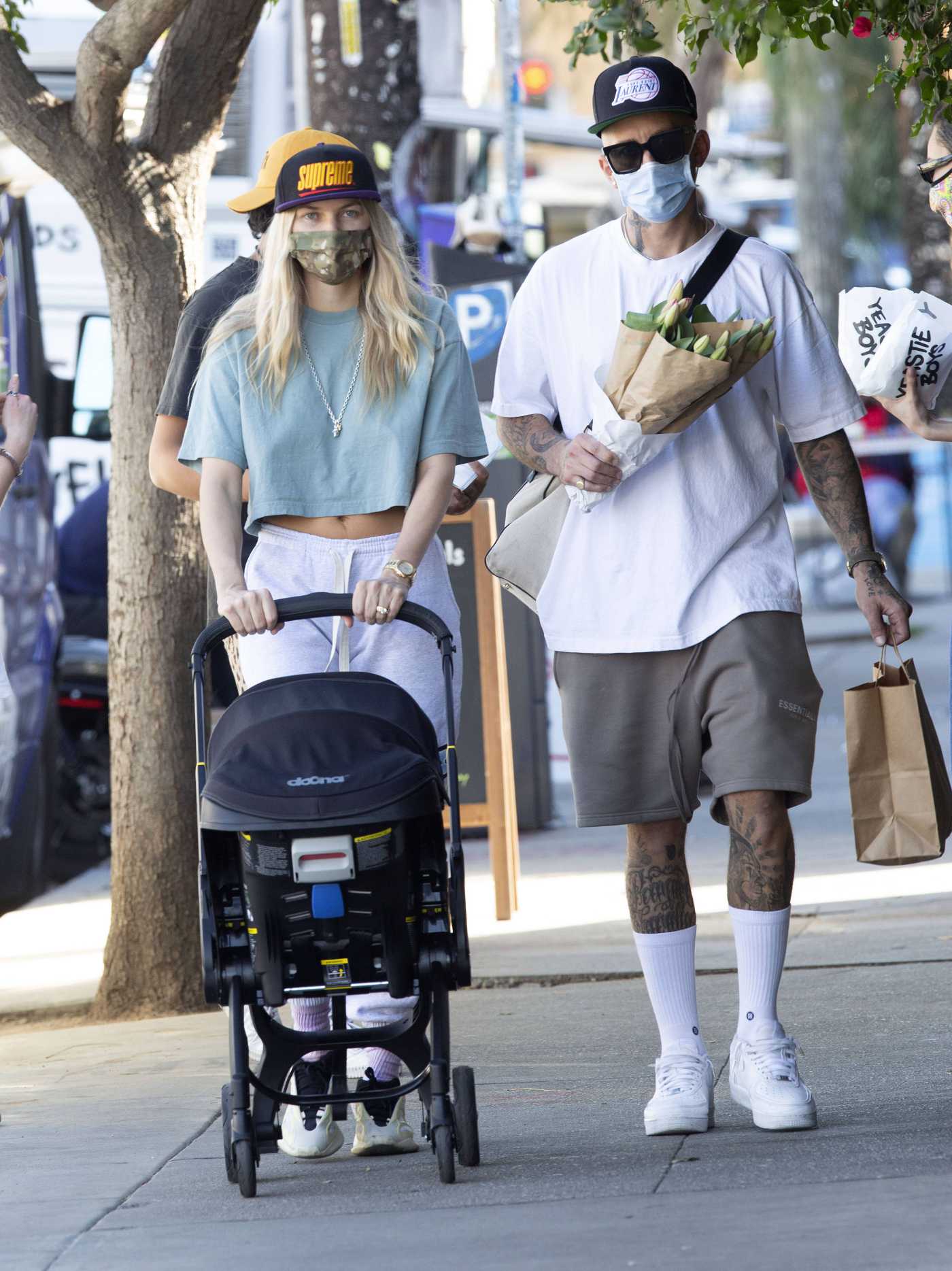 Jessica Hart in a Camo Protective Mask Was Seen Out with James Kirkham and Baby Rae in Los Angeles 01/18/2021
