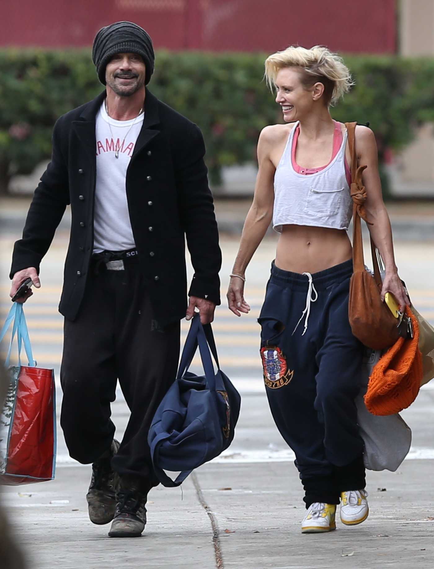 Nicky Whelan in a White Cropped Tank Top Leaves a Private Boxing Gym in Los Angeles 01/26/2021